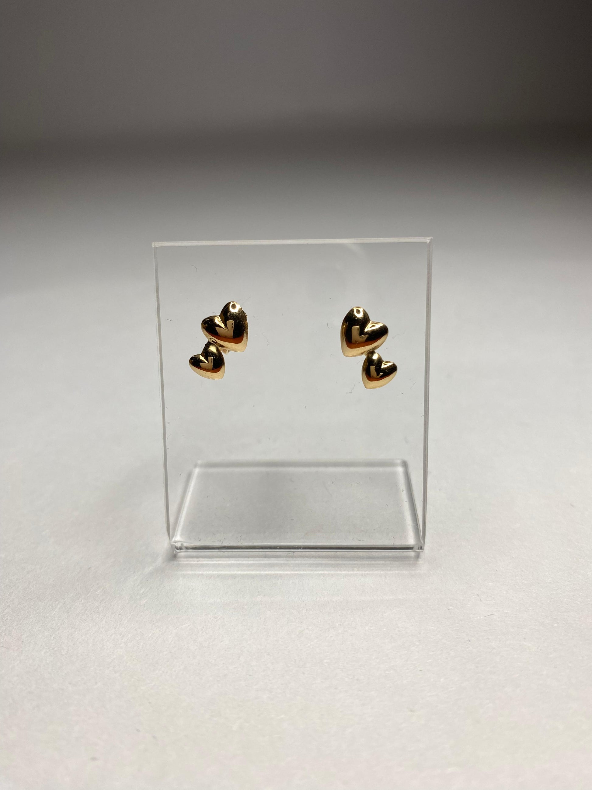 Aros doble corazón de oro 18k