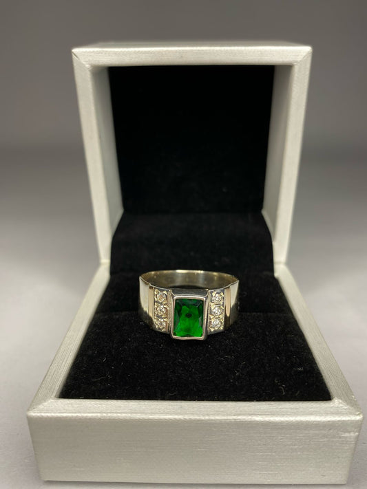Anillo de plata 950 con oro 14k. Más piedra esmeralda