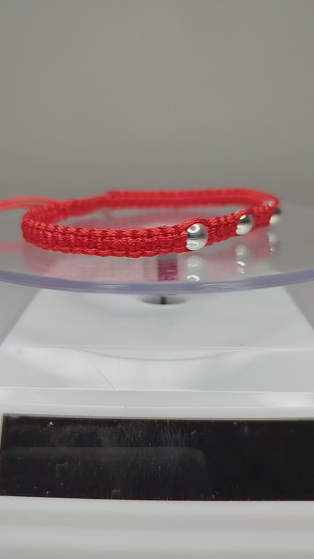 Pulsera de hilo rojo con 5 pelotitas de plata 950