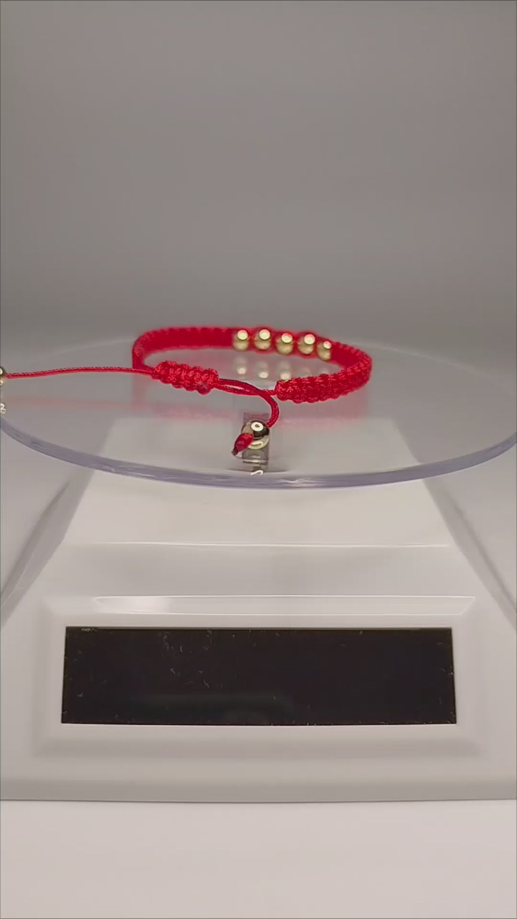 Pulsera de hilo rojo con 7 pelotitas de oro 14k / oro 18k (para niñ@s)