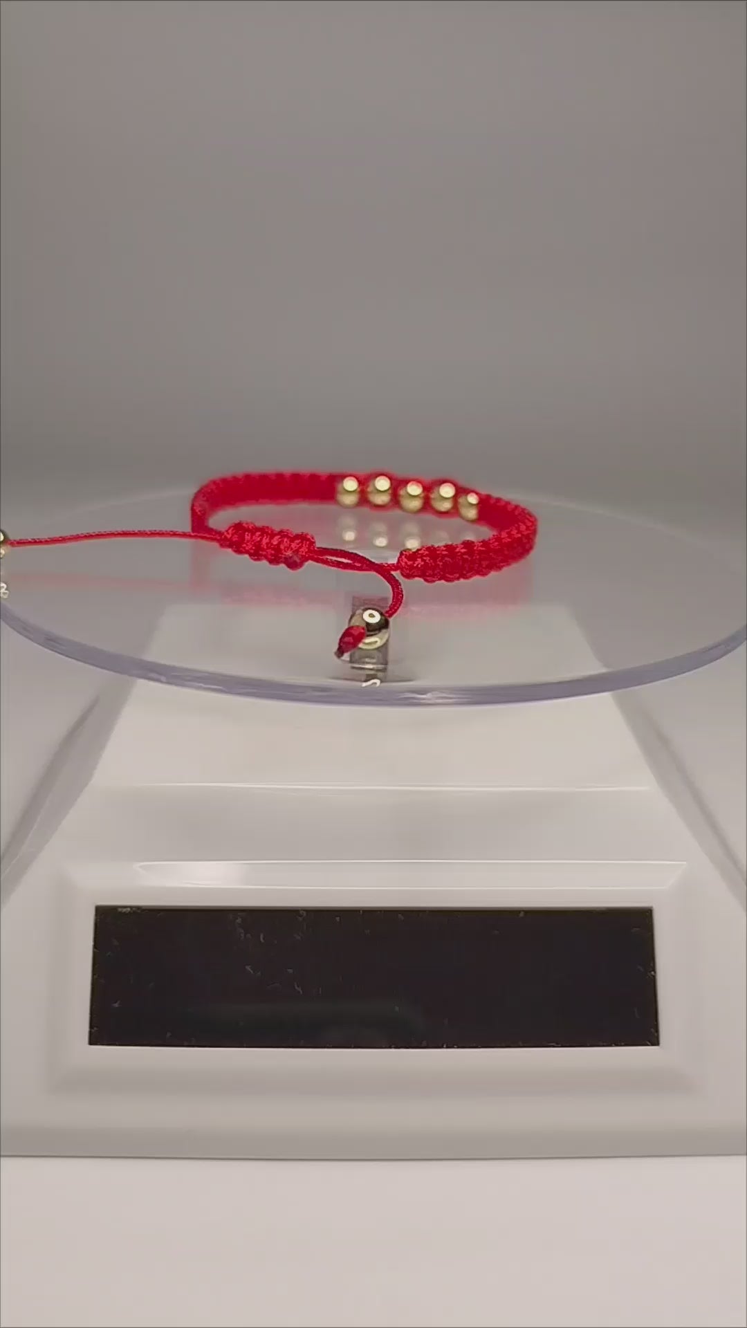 Pulsera de hilo rojo con 7 pelotitas de oro 14k / oro 18k (para niñ@s)
