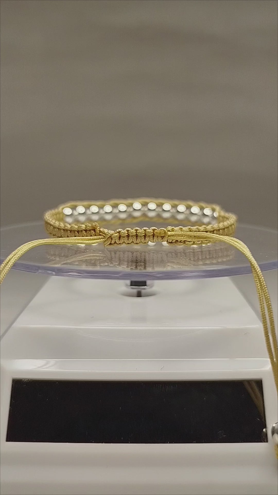 Pulsera de hilo beige con 14 pelotitas de plata 950
