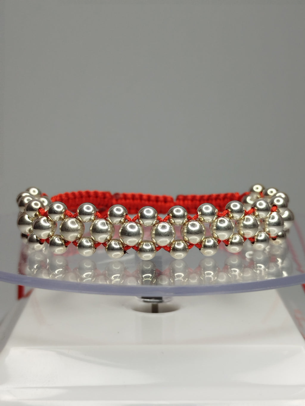 Pulsera de hilo rojo con 51 pelotitas de plata 950
