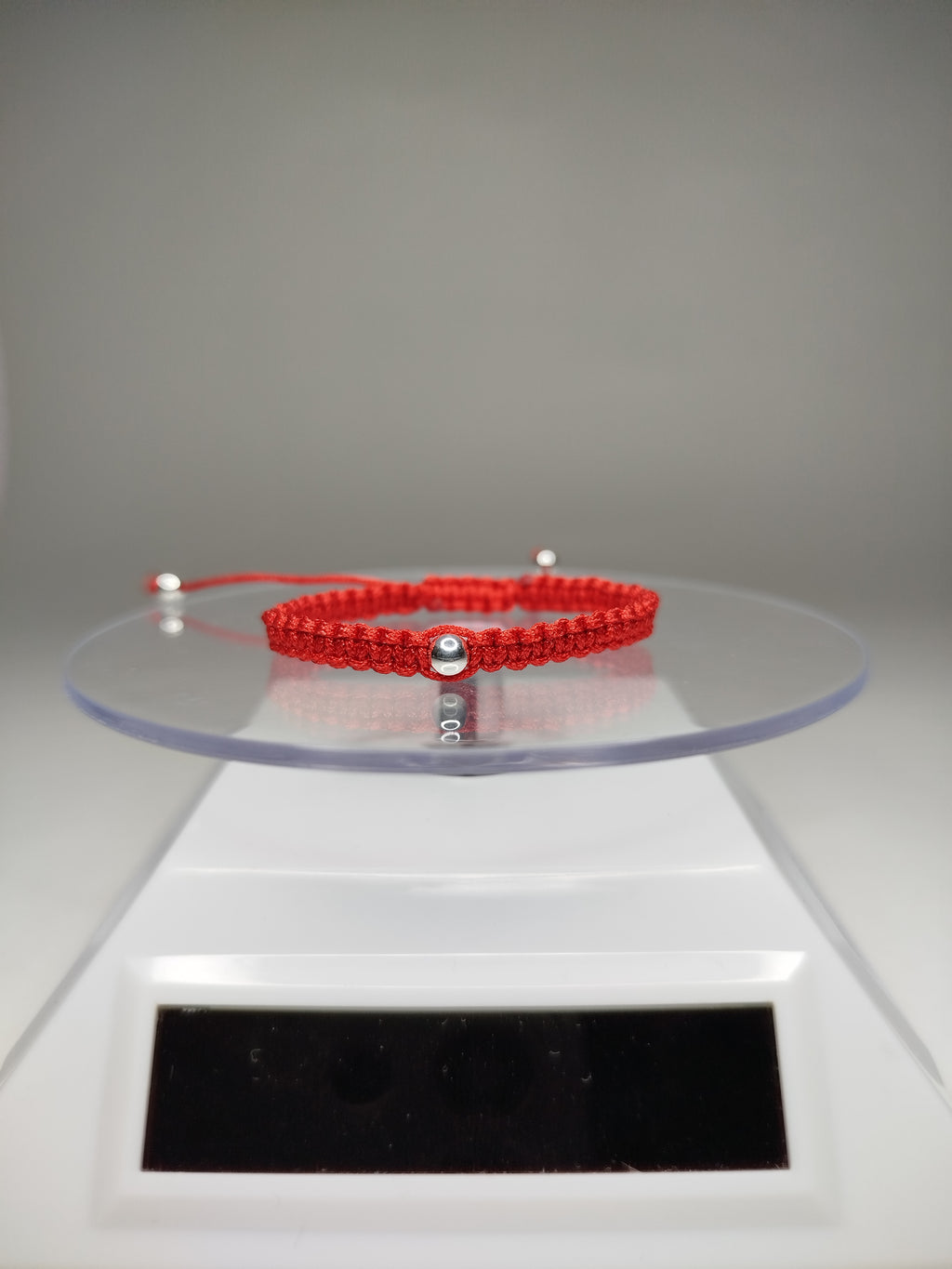 Pulsera de hilo rojo con 3 pelotitas de plata 950 (para niñ@s)