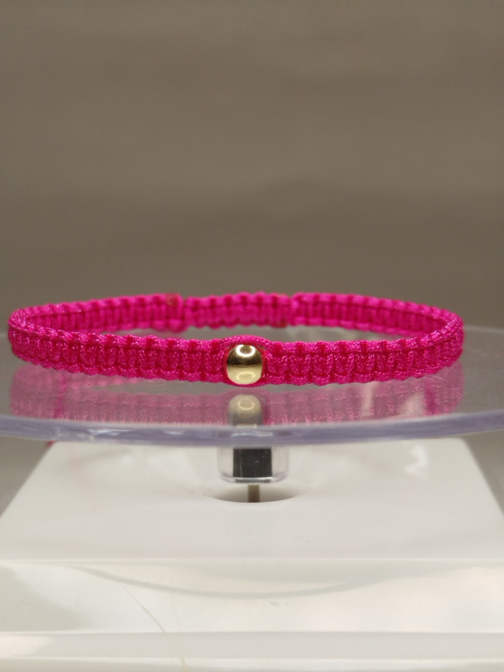Pulsera de hilo rosa con 3 pelotitas de oro 14k / oro 18k