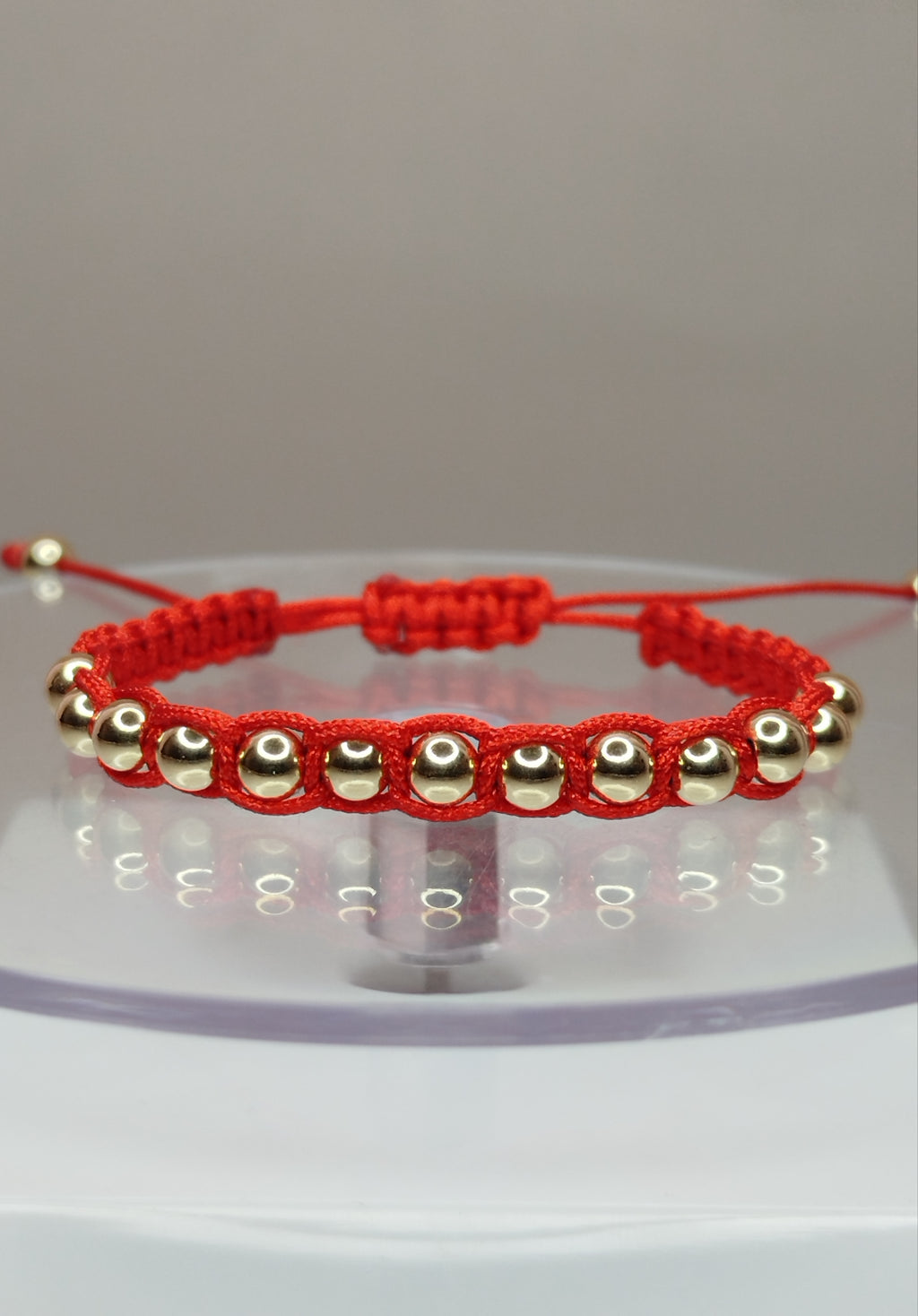 Pulsera de hilo rojo con 15 pelotitas de oro 14k / oro 18k (para niñ@s)