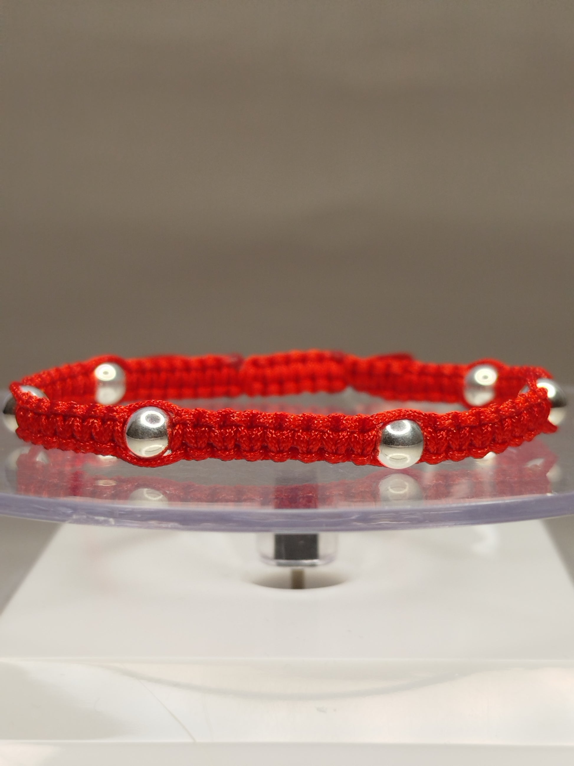 Pulsera de hilo rojo con 8 pelotitas de plata 950