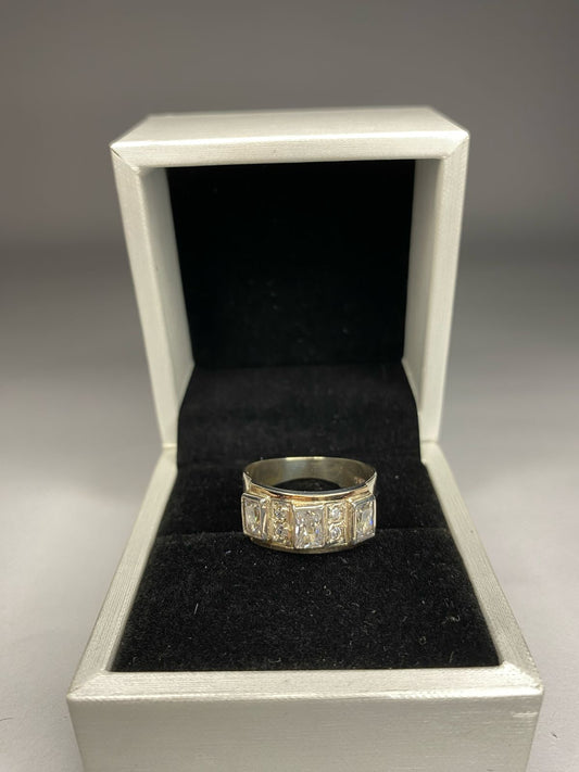 Anillo de plata 950 con oro 14k. Más piedra de cristal