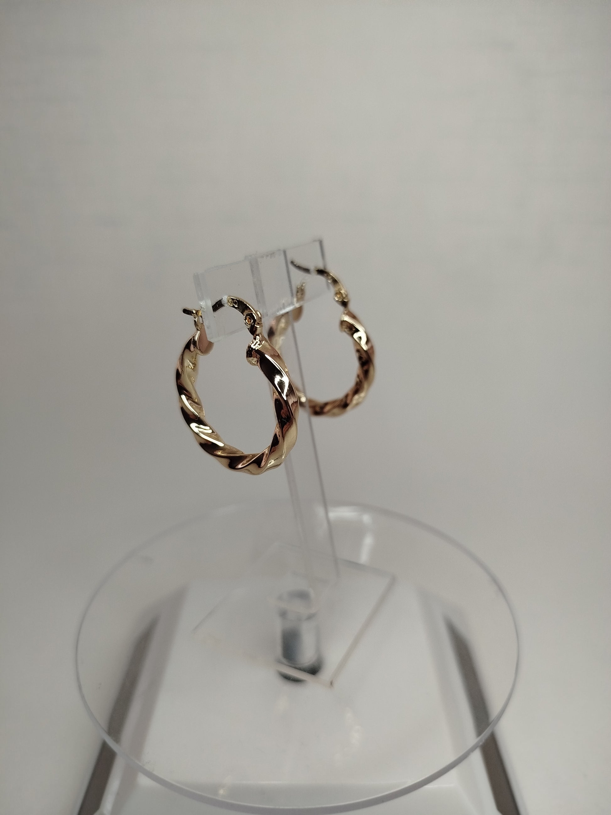 Aros enroscados de oro 14k