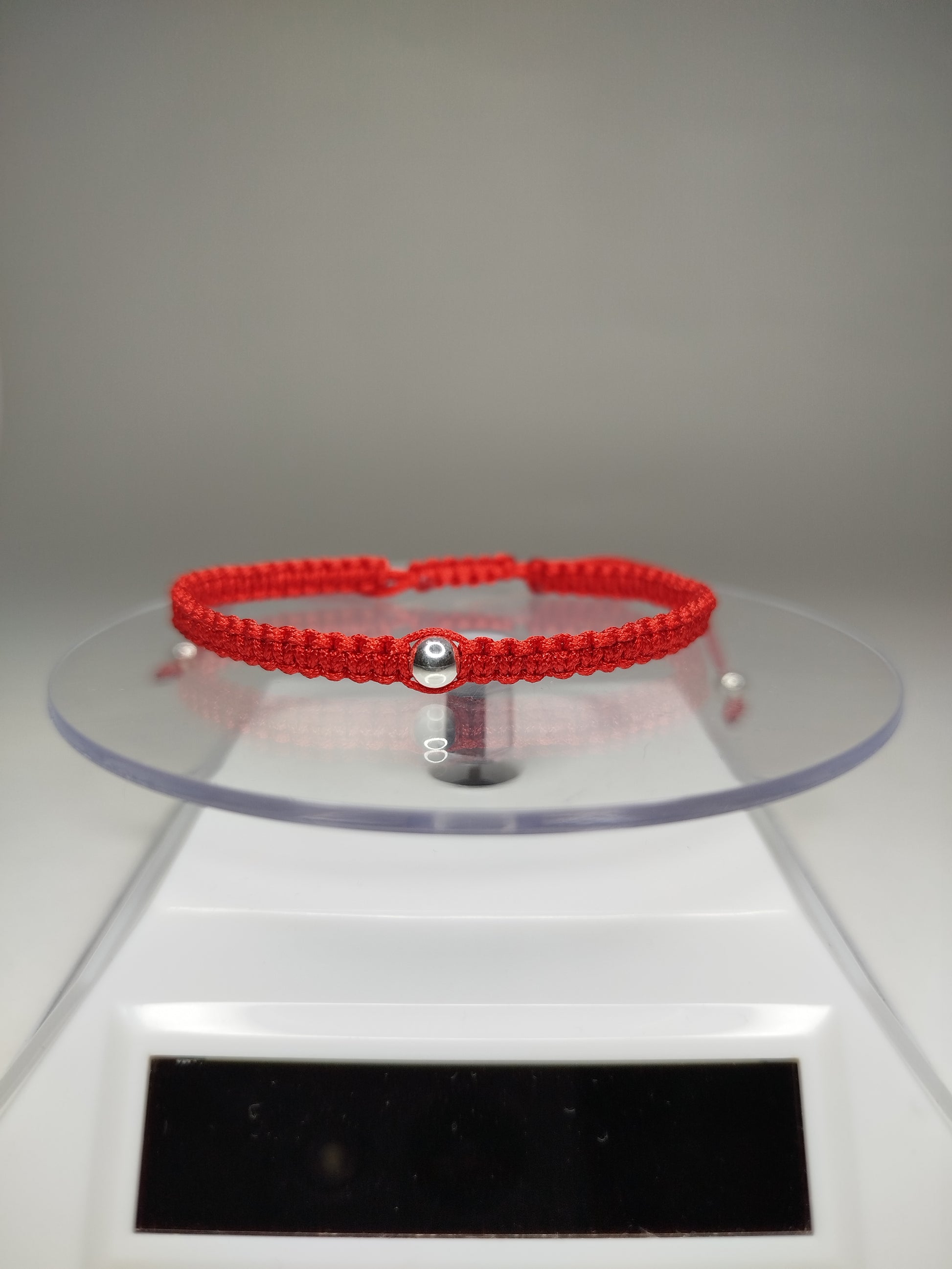 Pulsera de hilo rojo con 3 pelotitas de plata 950